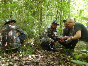 Dr. Kate Jenks teaching rangers how to program a camera trap.